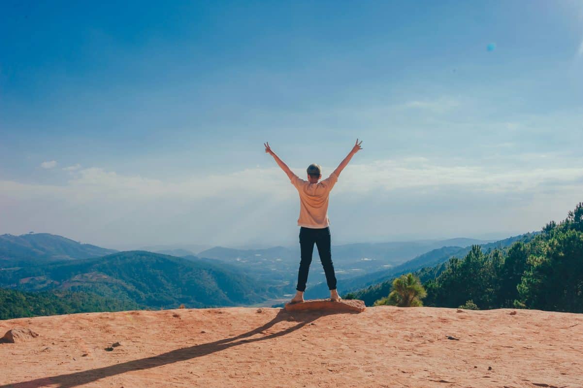 Photo by Min An: https://www.pexels.com/photo/woman-standing-on-cliff-1134190/