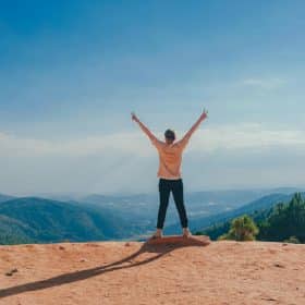 Photo by Min An: https://www.pexels.com/photo/woman-standing-on-cliff-1134190/