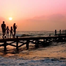 Photo by Pixabay: https://www.pexels.com/photo/people-standing-on-dock-during-sunrise-39691/