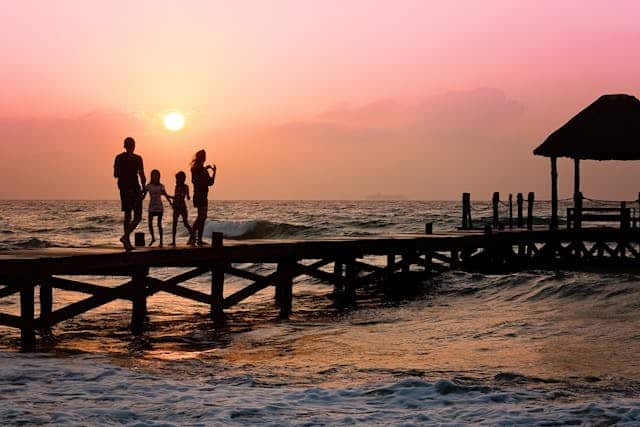 Photo by Pixabay: https://www.pexels.com/photo/people-standing-on-dock-during-sunrise-39691/