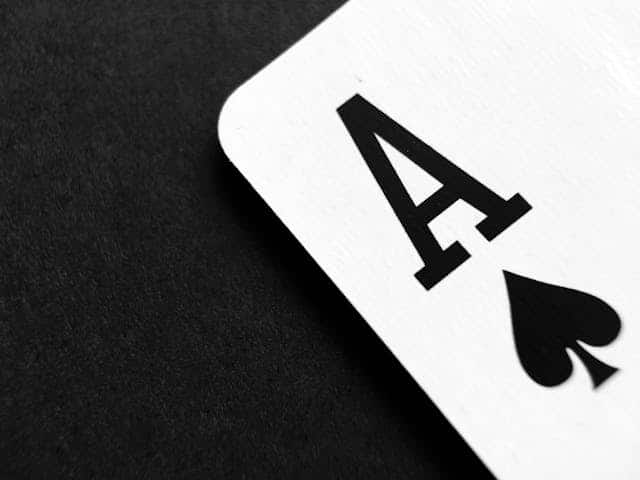 Photo by Pixabay: https://www.pexels.com/photo/ace-of-spade-playing-card-on-grey-surface-262333/