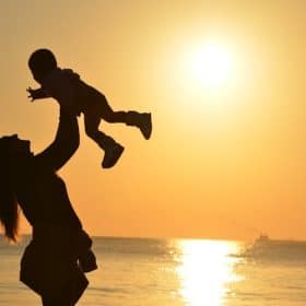 Photo by Pixabay: https://www.pexels.com/photo/silhouette-photo-of-a-mother-carrying-her-baby-at-beach-during-golden-hour-51953/