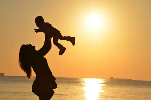 Photo by Pixabay: https://www.pexels.com/photo/silhouette-photo-of-a-mother-carrying-her-baby-at-beach-during-golden-hour-51953/